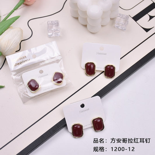 Fang Angolan red earrings