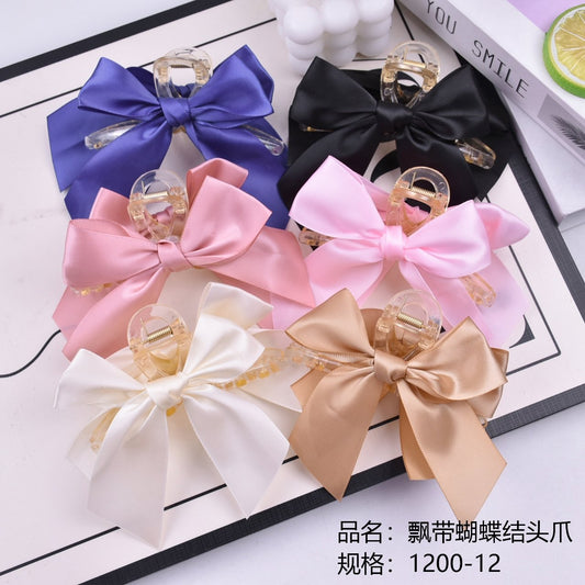 Ribbon bow head claws