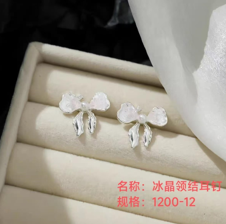 Ice crystal bow - tie stud earrings