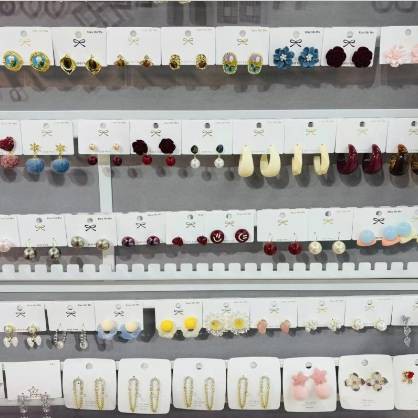 Multiple styles of earrings