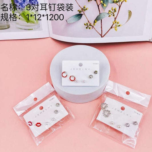 3 pairs of earrings in bags