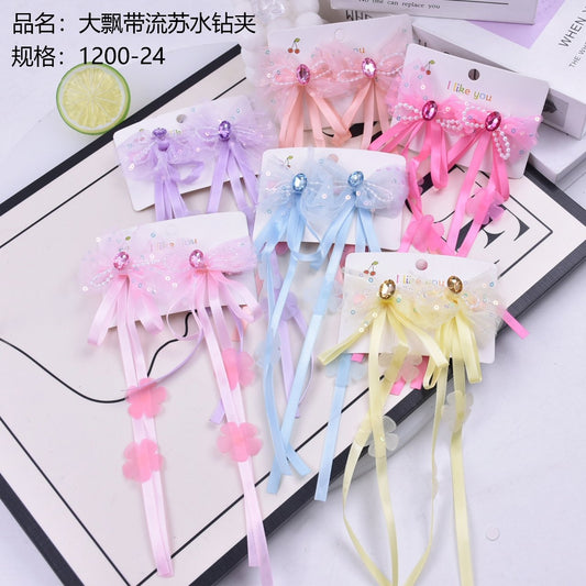 Large streamer tassel rhinestone clip