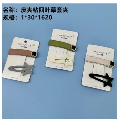 Wallet with four - leaf clover sleeve clip