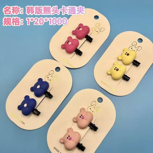 Korean - style bear - head cartoon clip