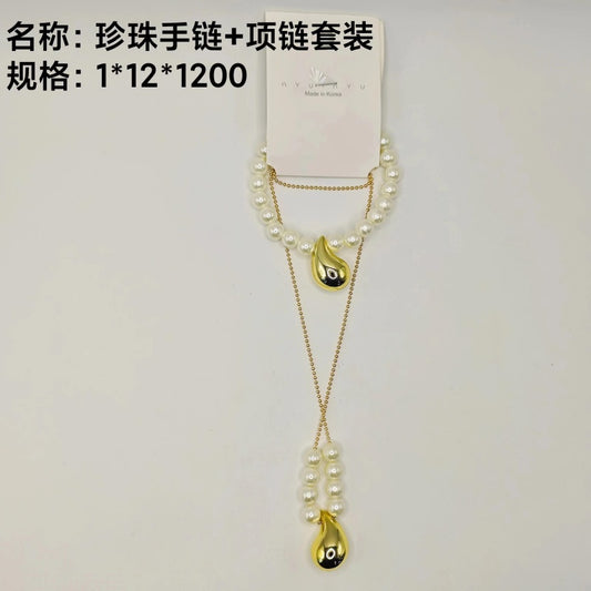 Pearl bracelet + necklace set